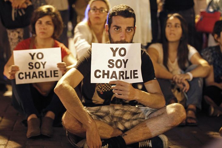 4551189_6_c841_people-hold-prints-reading-i-am-charlie_2bf5cf8217b72656454079e1779f575f